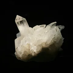 a white crystal with a black background